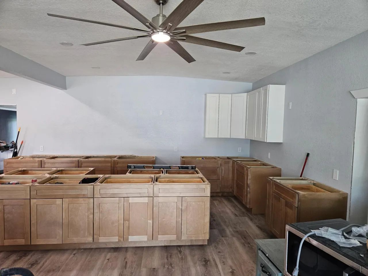 Shaker cabinet installation in progress